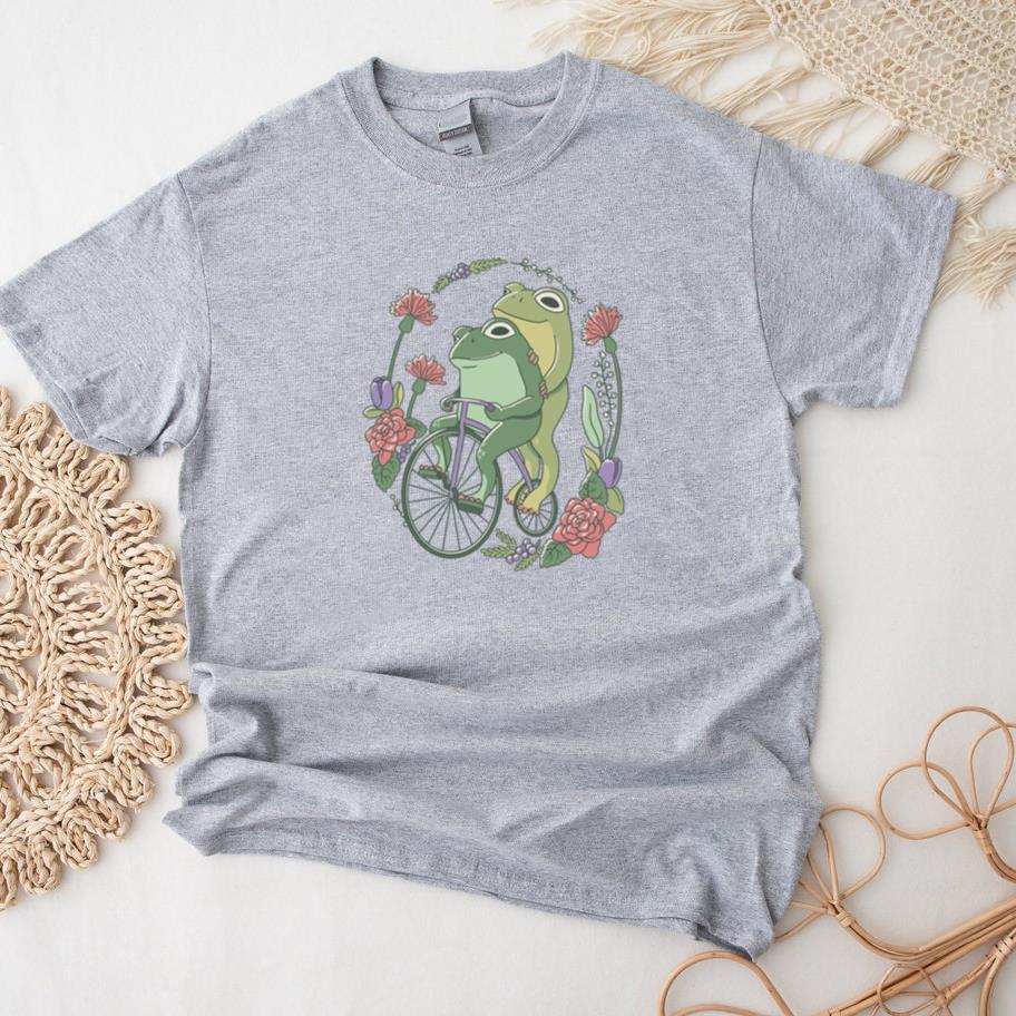 Two Frogs Riding A Bicycle Surrounded By Flowers T-Shirt